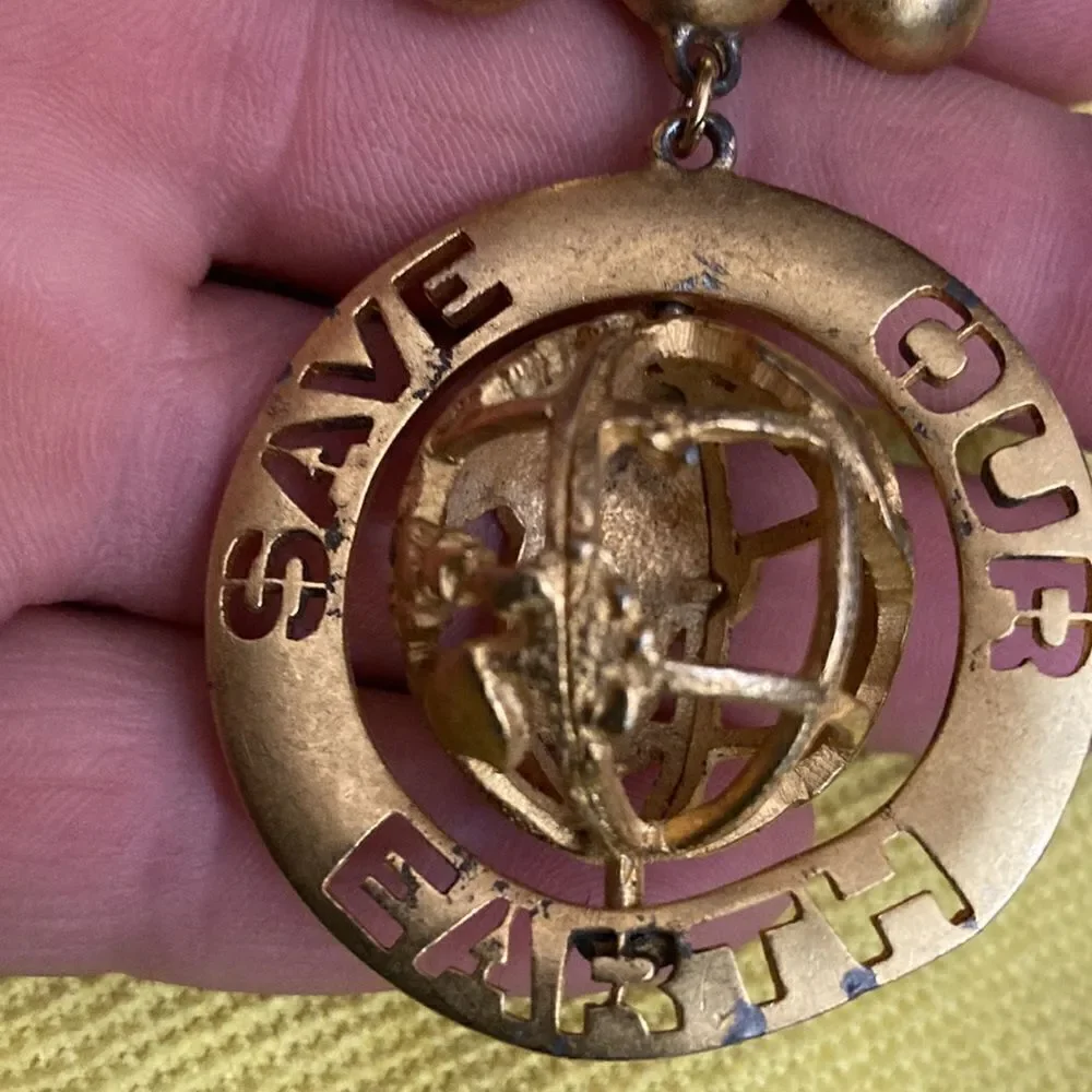 D torem renclif save our world vintage brooch